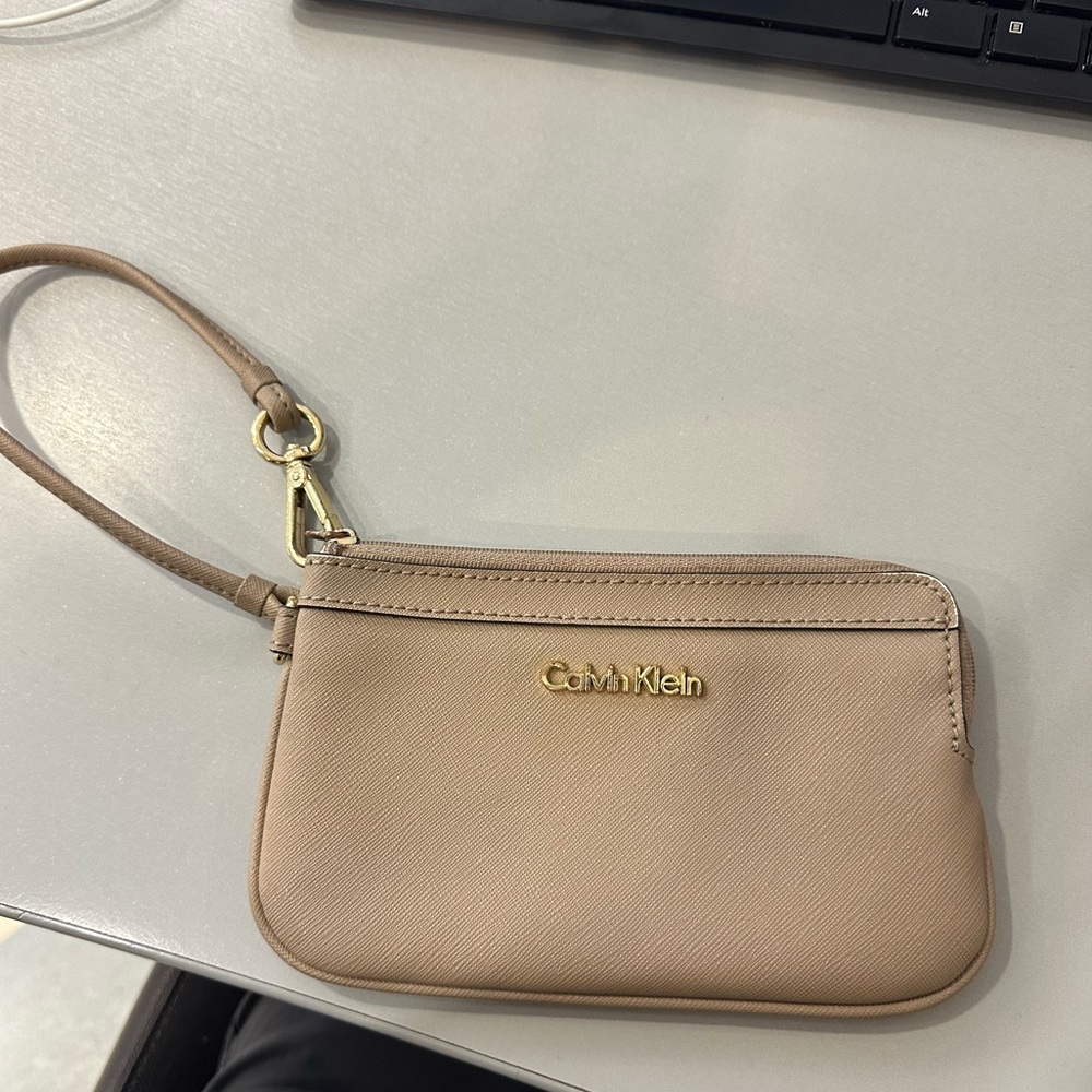 Calvin Klein Women's Large Zip Wristlet is a travel-ready wristlet
